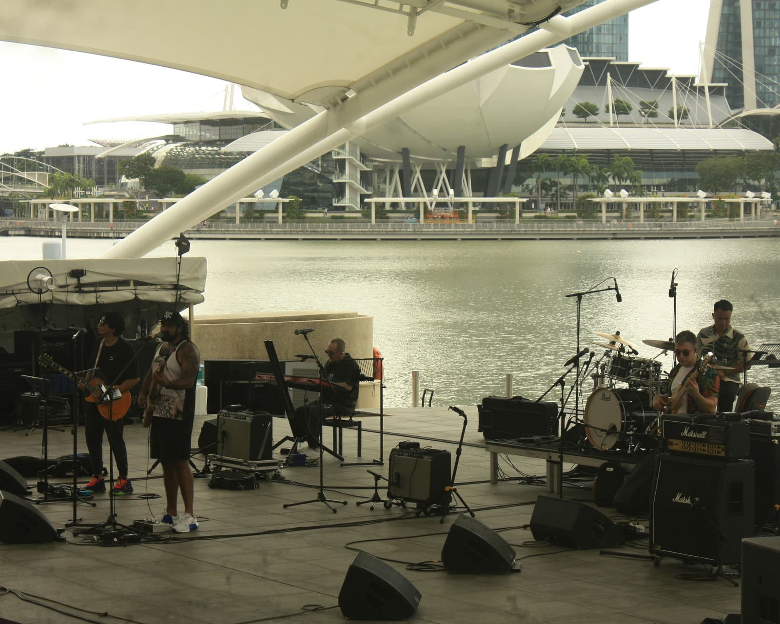 A live band performing outdoors at Marina Bay Sands